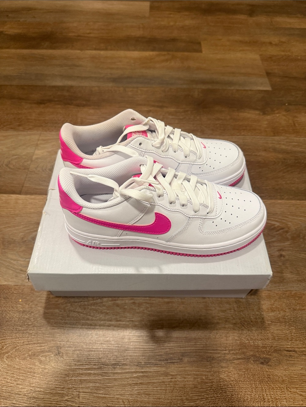 Nike Kids White Sneakers with Hot Pink Swoosh